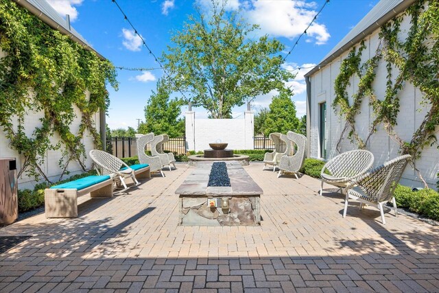 16098 Garganey Ct, Frisco, TX 75035 - view of patio / terrace featuring a fire pit