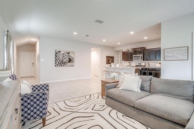 16556 White Fish Ln, Justin, TX 76247 - living room with light tile patterned floors, recessed lighting, and baseboards
