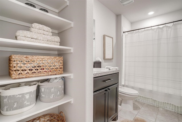 16556 White Fish Ln, Justin, TX 76247 - full bathroom with toilet, vanity, and tile patterned flooring