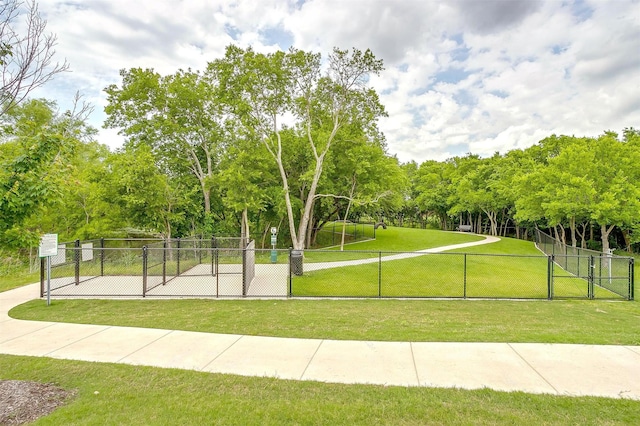 16556 White Fish Ln, Justin, TX 76247 - surrounding community featuring a gate and view of wooded area