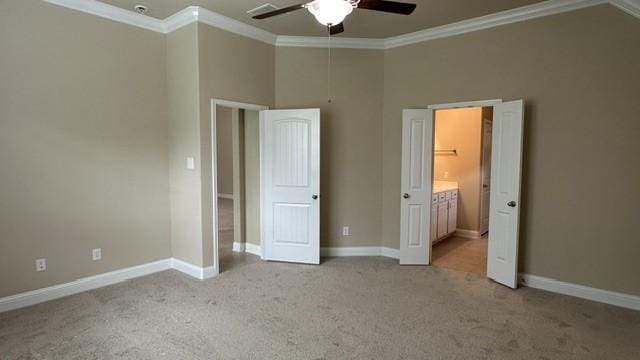 8602 Venezia Terrace Ct, Cypress, TX 77433 - unfurnished bedroom featuring crown molding, light colored carpet, baseboards, connected bathroom, and a ceiling fan