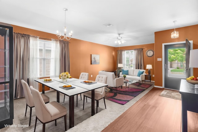 805 Canyon Pl, Desoto, TX 75115 - dining space with light wood-style flooring, a chandelier, ceiling fan, and baseboards