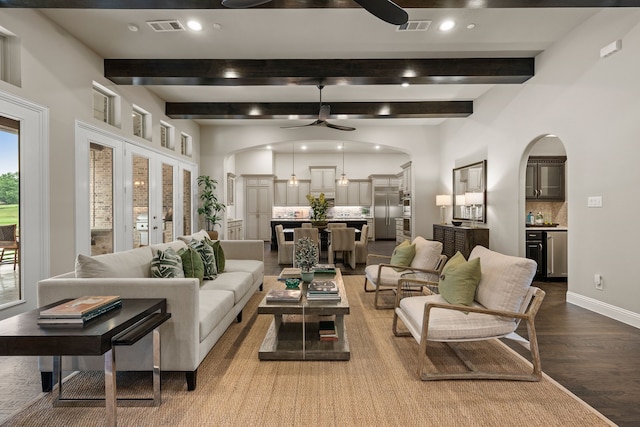 2100 Veranda Ave, Trophy Club, TX 76262 - living area with ceiling fan, arched walkways, beamed ceiling, recessed lighting, and wood finished floors