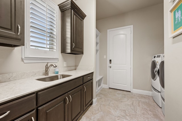 2100 Veranda Ave, Trophy Club, TX 76262 - laundry area featuring washer and clothes dryer, cabinet space, and baseboards