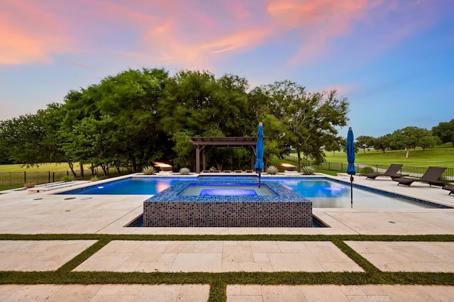 2100 Veranda Ave, Trophy Club, TX 76262 - pool at dusk with a patio, a pergola, and a pool with connected hot tub