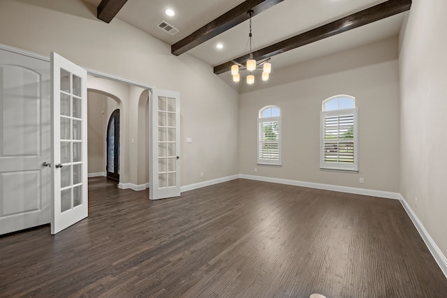 2100 Veranda Ave, Trophy Club, TX 76262 - empty room featuring french doors, dark wood-type flooring, arched walkways, and baseboards