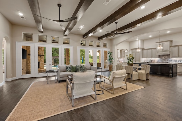 2100 Veranda Ave, Trophy Club, TX 76262 - living area with ceiling fan, arched walkways, dark wood finished floors, recessed lighting, and french doors