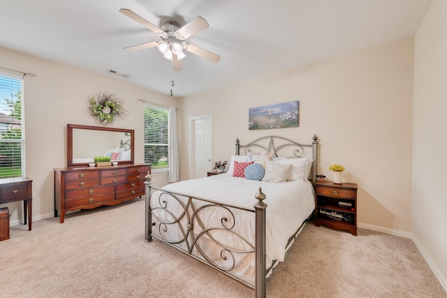 1090 Potter Ave, Rockwall, TX 75087 - bedroom with light colored carpet, baseboards, and a ceiling fan