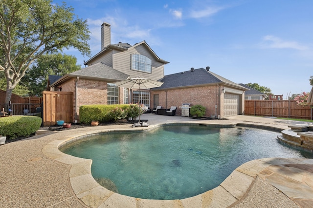 2628 Caddo Ct, Frisco, TX 75033 - view of swimming pool featuring a fenced backyard, a pool with connected hot tub, and a patio