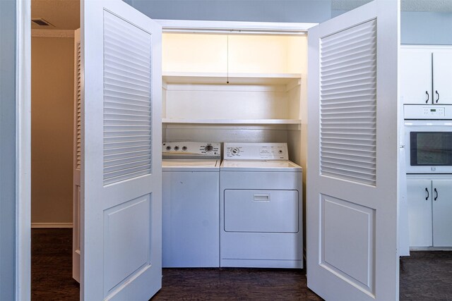 8351-8353 Lullwater Dr, Dallas, TX 75218 - laundry room with washing machine and clothes dryer and dark wood-type flooring
