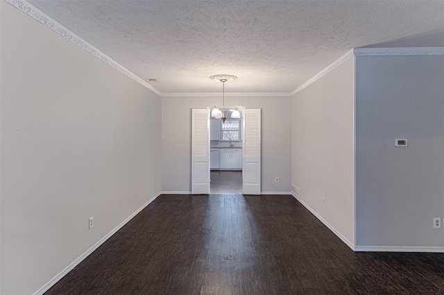 8351-8353 Lullwater Dr, Dallas, TX 75218 - unfurnished room with dark wood-type flooring, a textured ceiling, baseboards, ornamental molding, and a sink