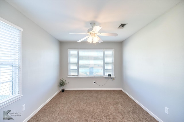 821 Cherry Ln, Clyde, TX 79510 - empty room featuring carpet, ceiling fan, and baseboards
