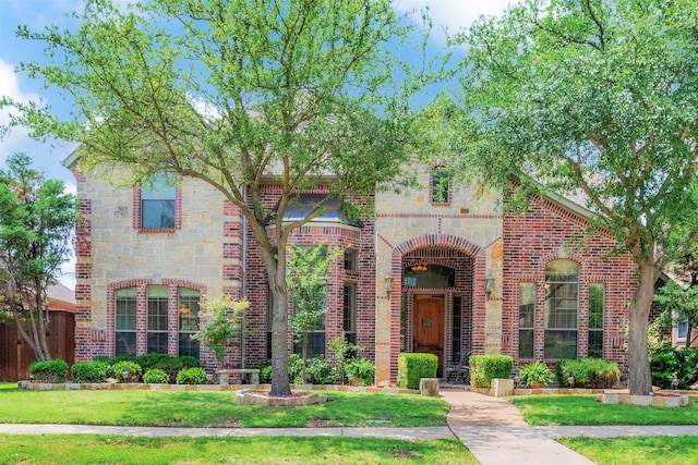 1217 Kent Brown Rd, Garland, TX 75044 - view of front of house with brick siding and a front yard