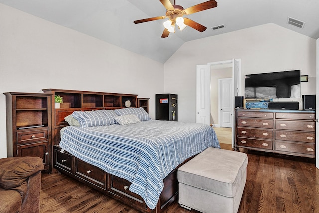 1217 Kent Brown Rd, Garland, TX 75044 - bedroom with vaulted ceiling, dark wood finished floors, and a ceiling fan