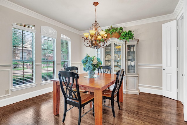 1217 Kent Brown Rd, Garland, TX 75044 - dining space with a chandelier, crown molding, and dark wood-style floors