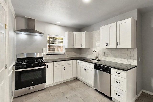 3617 Willing Ave, Fort Worth, TX 76110 - kitchen featuring stainless steel appliances, a sink, wall chimney exhaust hood, tasteful backsplash, and dark countertops