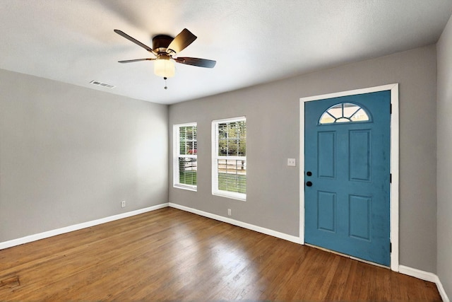 3617 Willing Ave, Fort Worth, TX 76110 - foyer featuring baseboards, wood finished floors, and a ceiling fan