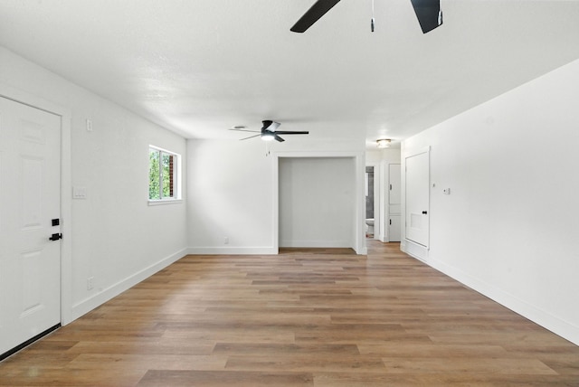 1423 W Ball St, Weatherford, TX 76086 - empty room with ceiling fan and light wood-type flooring