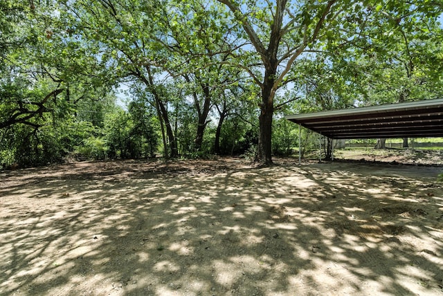 1423 W Ball St, Weatherford, TX 76086 - view of parking / parking lot with a carport