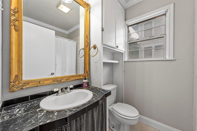 2530 Colcord, Waco, TX 76707 - bathroom featuring ornamental molding, toilet, vanity, and tile patterned floors