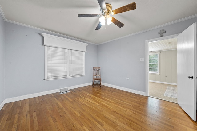 2530 Colcord, Waco, TX 76707 - unfurnished room with wood finished floors, crown molding, a ceiling fan, and baseboards