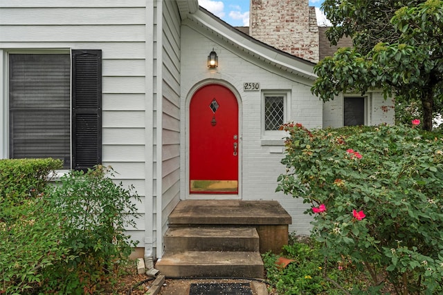 2530 Colcord, Waco, TX 76707 - view of exterior entry with a chimney