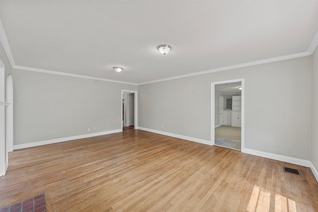 2530 Colcord, Waco, TX 76707 - empty room with baseboards, ornamental molding, and light wood-type flooring