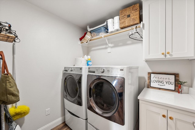 1321 Thistle Hill Trl, Weatherford, TX 76087 - laundry room featuring cabinet space, washer and clothes dryer, baseboards, and wood finished floors