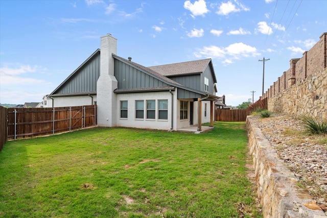 1321 Thistle Hill Trl, Weatherford, TX 76087 - rear view of house with board and batten siding, a chimney, and a shingled roof