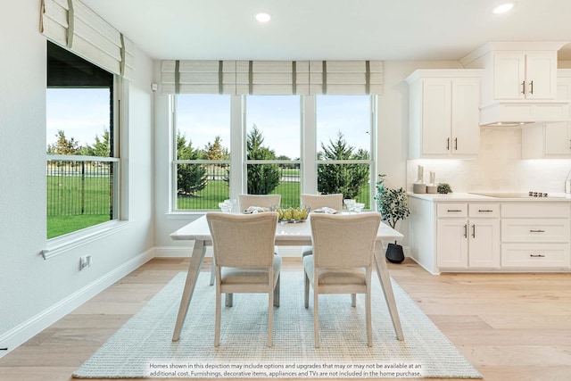 401 Sparrow Dr, Wylie, TX 75098 - dining space featuring baseboards, light wood-style floors, and recessed lighting