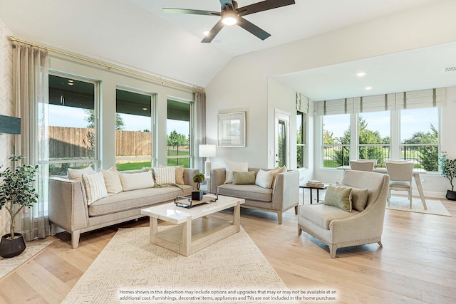 401 Sparrow Dr, Wylie, TX 75098 - living area with healthy amount of natural light, ceiling fan, vaulted ceiling, and light wood-style flooring