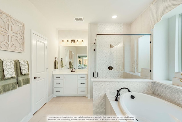 401 Sparrow Dr, Wylie, TX 75098 - bathroom featuring a shower stall, a garden tub, vanity, and tile patterned flooring