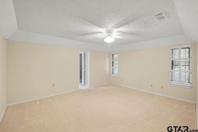 641 Hideaway Ln E, Hideaway, TX 75771 - unfurnished room with ceiling fan, light colored carpet, baseboards, and a textured ceiling