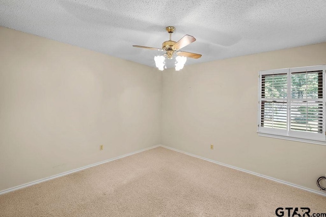 641 Hideaway Ln E, Hideaway, TX 75771 - carpeted empty room with a textured ceiling, a ceiling fan, and baseboards
