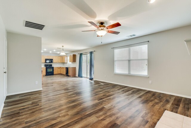 1508 Caymus Ct, Lewisville, TX 75067 - unfurnished living room featuring ceiling fan, recessed lighting, dark wood-type flooring, and baseboards
