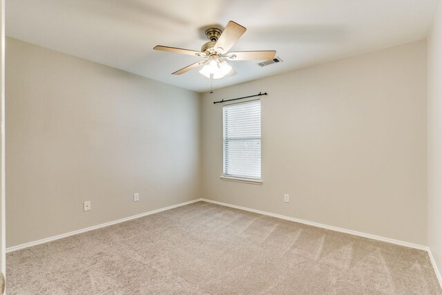 1508 Caymus Ct, Lewisville, TX 75067 - spare room with carpet, ceiling fan, and baseboards