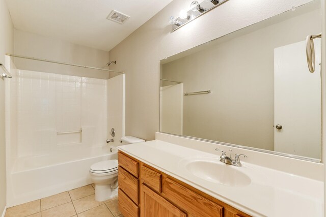 1508 Caymus Ct, Lewisville, TX 75067 - bathroom with toilet, tile patterned floors, vanity, and  shower combination