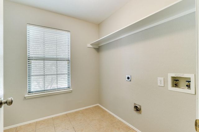 1508 Caymus Ct, Lewisville, TX 75067 - washroom with electric dryer hookup, washer hookup, baseboards, and light tile patterned floors