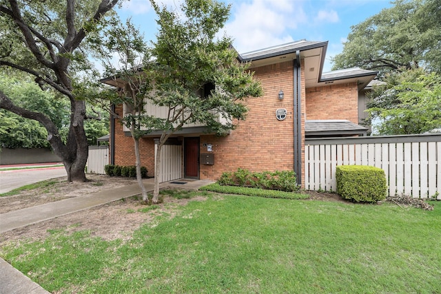 2807 Lineville Dr Unit 104, Farmers Branch, TX 75234 - view of front of home featuring brick siding