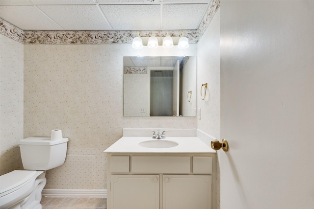2807 Lineville Dr Unit 104, Farmers Branch, TX 75234 - bathroom with toilet, wallpapered walls, vanity, tile patterned flooring, and baseboards