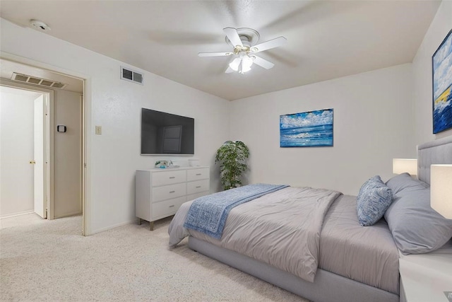 2807 Lineville Dr Unit 104, Farmers Branch, TX 75234 - bedroom with light carpet, baseboards, and ceiling fan