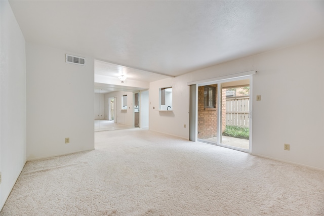 2807 Lineville Dr Unit 104, Farmers Branch, TX 75234 - empty room with light carpet and baseboards