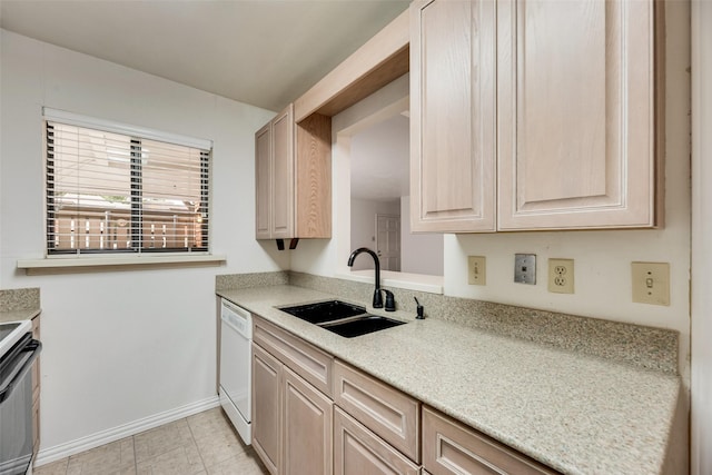 2807 Lineville Dr Unit 104, Farmers Branch, TX 75234 - kitchen featuring a sink, white dishwasher, electric stove, baseboards, and light brown cabinetry