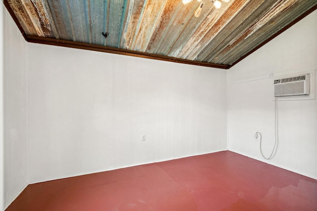 1083 Vz County Road 1319, Grand Saline, TX 75140 - empty room with a wall unit AC and vaulted ceiling