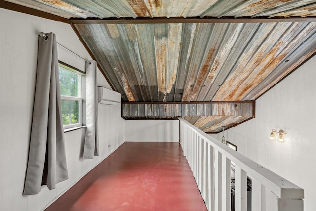 1083 Vz County Road 1319, Grand Saline, TX 75140 - hallway with a wall mounted AC, lofted ceiling, concrete flooring, and wood ceiling