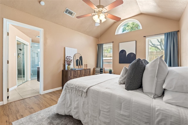 10328 Lone Pine Ln, Fort Worth, TX 76108 - bedroom with wood finished floors, lofted ceiling, ceiling fan, baseboards, and connected bathroom