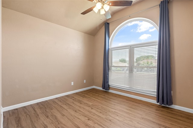 10328 Lone Pine Ln, Fort Worth, TX 76108 - empty room featuring lofted ceiling, ceiling fan, wood finished floors, and baseboards