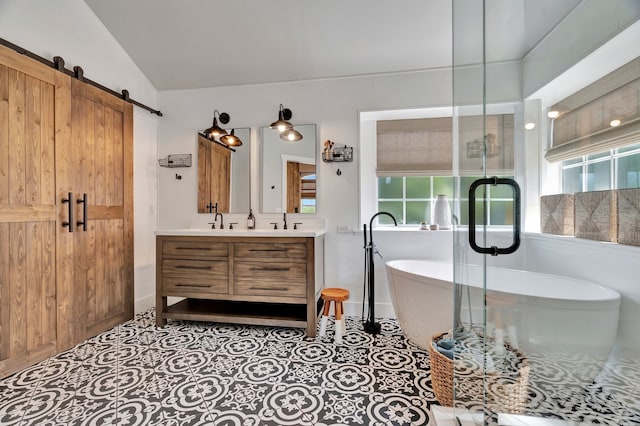 940 Crown Ct, Highland Village, TX 75077 - bathroom with double vanity, a freestanding bath, healthy amount of natural light, vaulted ceiling, and a shower with shower door
