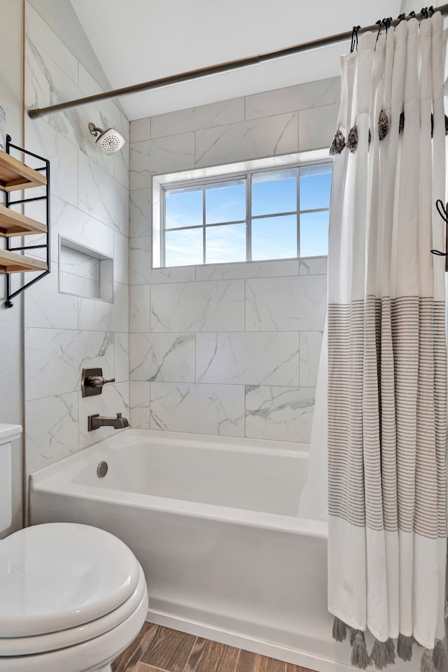 940 Crown Ct, Highland Village, TX 75077 - bathroom featuring toilet, shower / tub combo, and wood finished floors