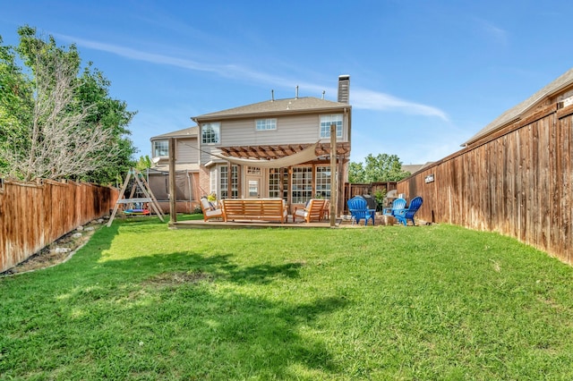 940 Crown Ct, Highland Village, TX 75077 - rear view of house with an outdoor living space and a chimney